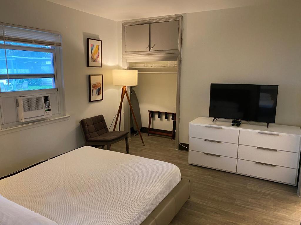 TV a/nebo společenská místnost v ubytování Rolo Beach Hotel