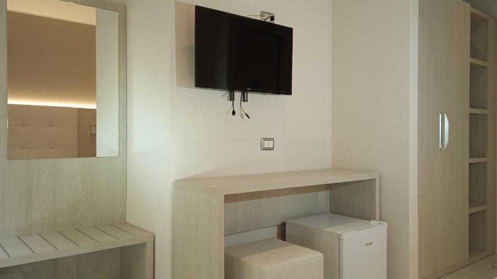 TV a/nebo společenská místnost v ubytování Hotel Stefan Room & Breakfast