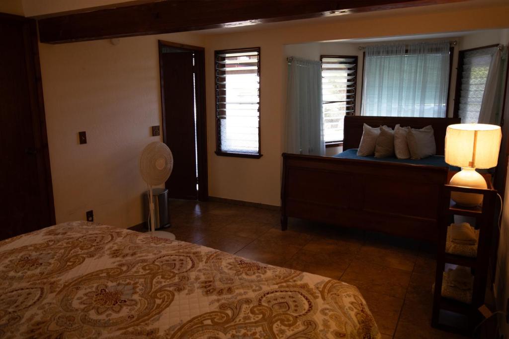 Postel nebo postele na pokoji v ubytování Hawaii Island Resort