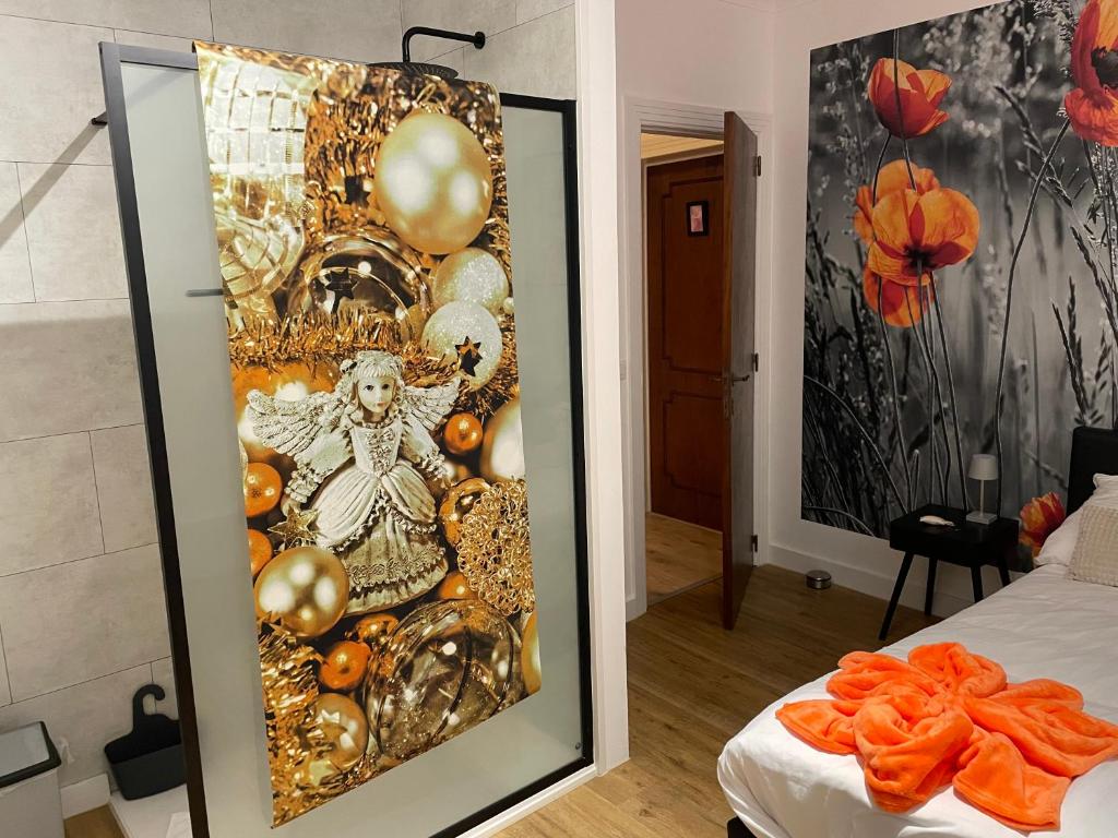 Postel nebo postele na pokoji v ubytování B&B L’Orangerie