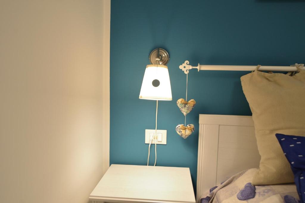 Postel nebo postele na pokoji v ubytování Dimora Pascali - Home & Relax