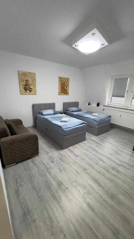 Apartment am Zollverein -WiFi - Parking for free - Twee Slaapkamers Appartement