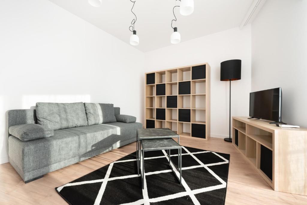 Et sittehjørne på Warszawa Okęcie Modern Apartment