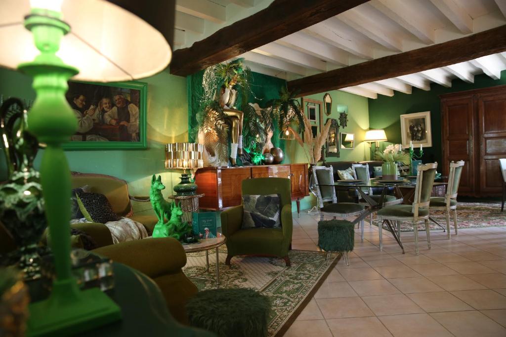 Posezení v ubytování Taty Ginette Maison et Table d'Hôtes