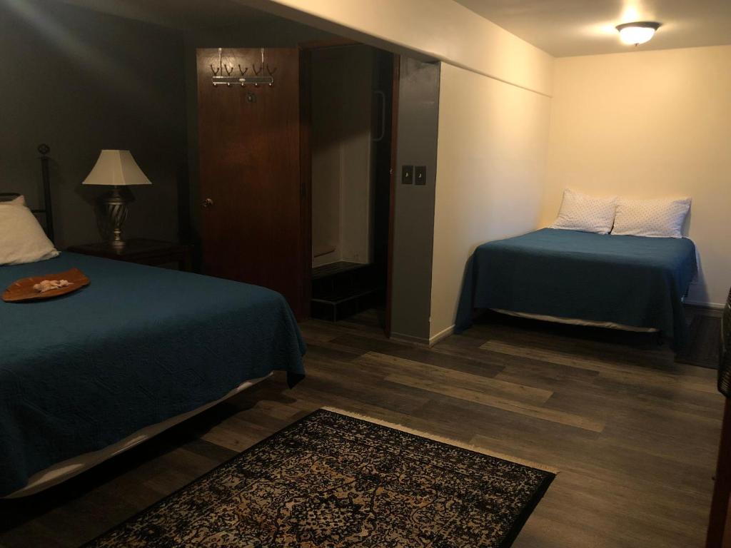 Postel nebo postele na pokoji v ubytování Hawaii Island Resort