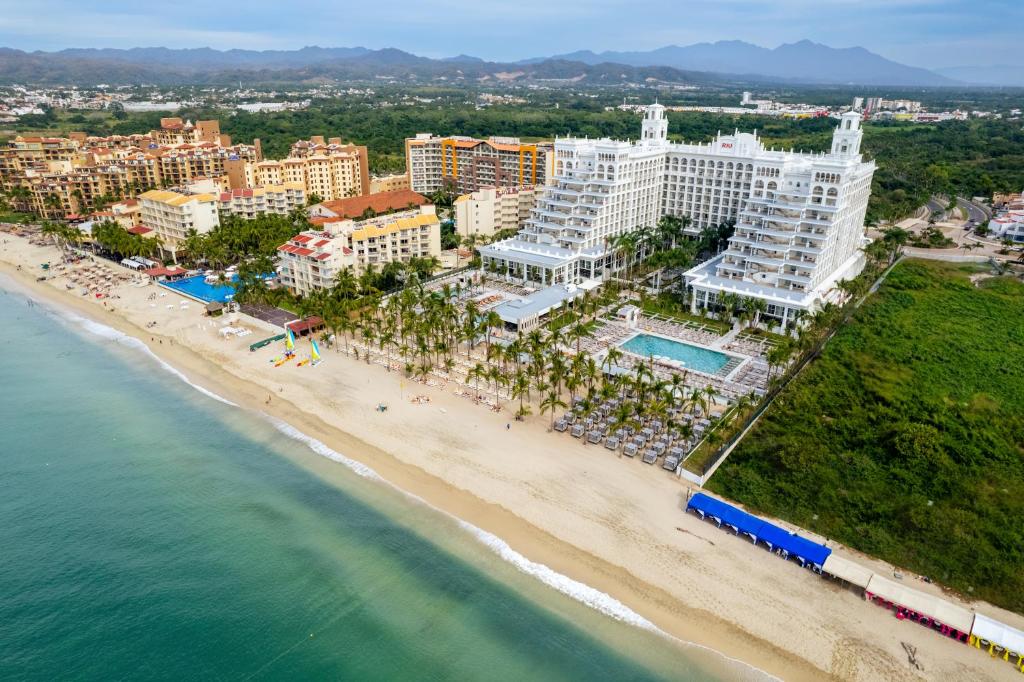 an aerial view of a resort on the beach at Riu Palace Pacifico - All Inclusive - Adults Only in Nuevo Vallarta 