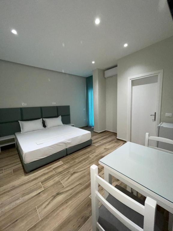 Postel nebo postele na pokoji v ubytování Hotel Rai
