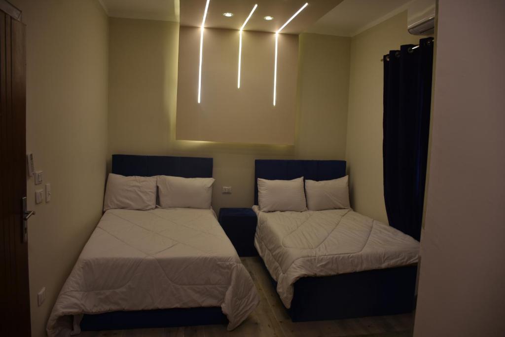 Letto o letti in una camera di Moses Pyramids Inn