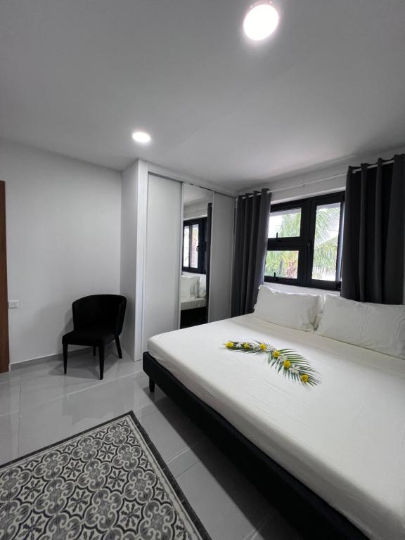 Кровать или кровати в номере Amanahune Lodge - Bora Bora