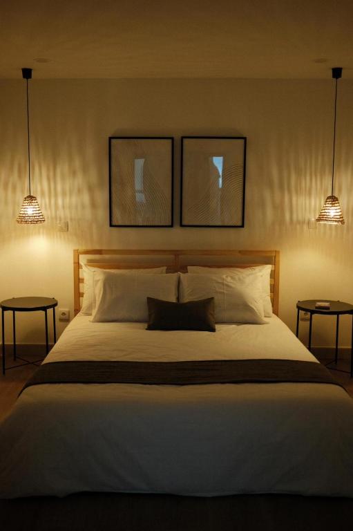 Кровать или кровати в номере CASA15 Guesthouse Funchal