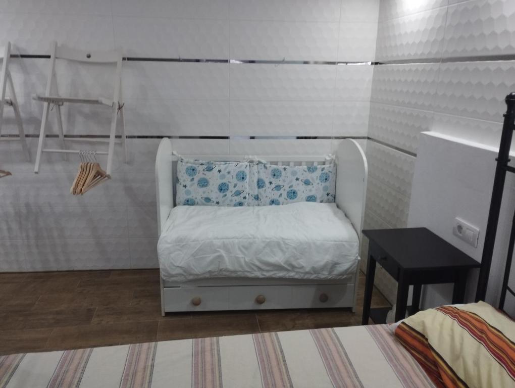 Postel nebo postele na pokoji v ubytování Las palmeras