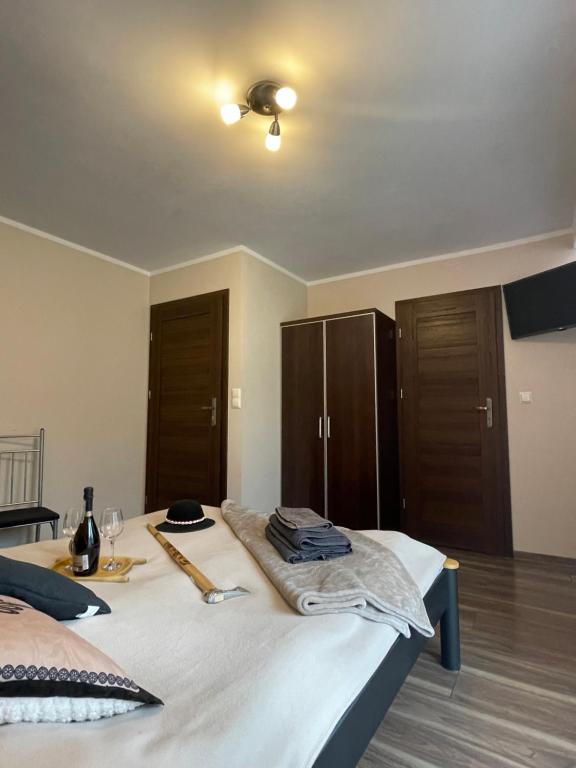 Postel nebo postele na pokoji v ubytování HELLO GIEWONT