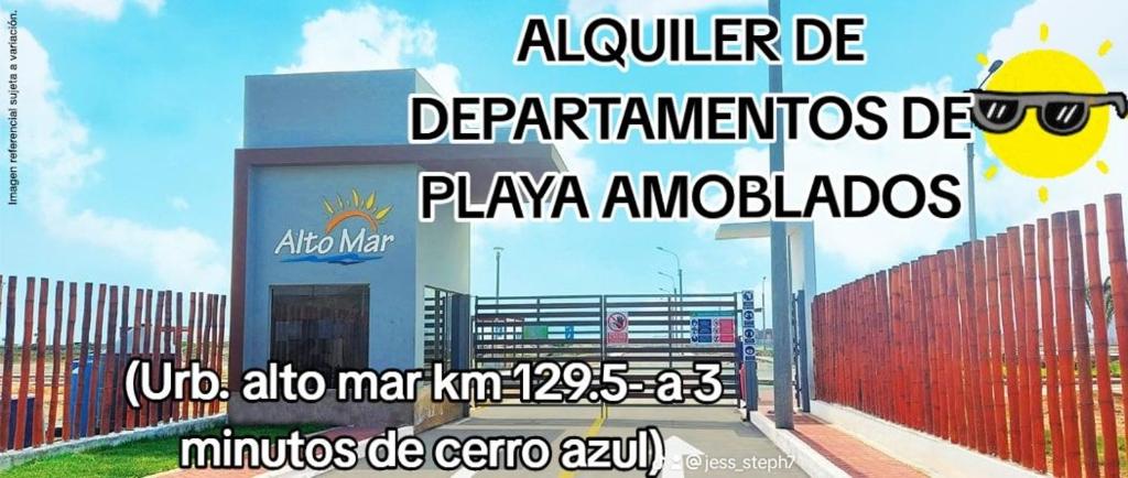un panneau indiquant un bâtiment avec une clôture rouge dans l'établissement Departamento de playa amoblado, à Cerro Azul
