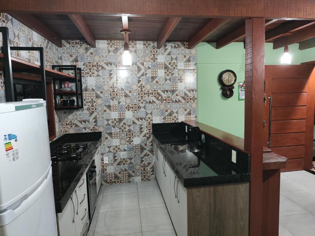 Kuchyň nebo kuchyňský kout v ubytování Chalé bela vista