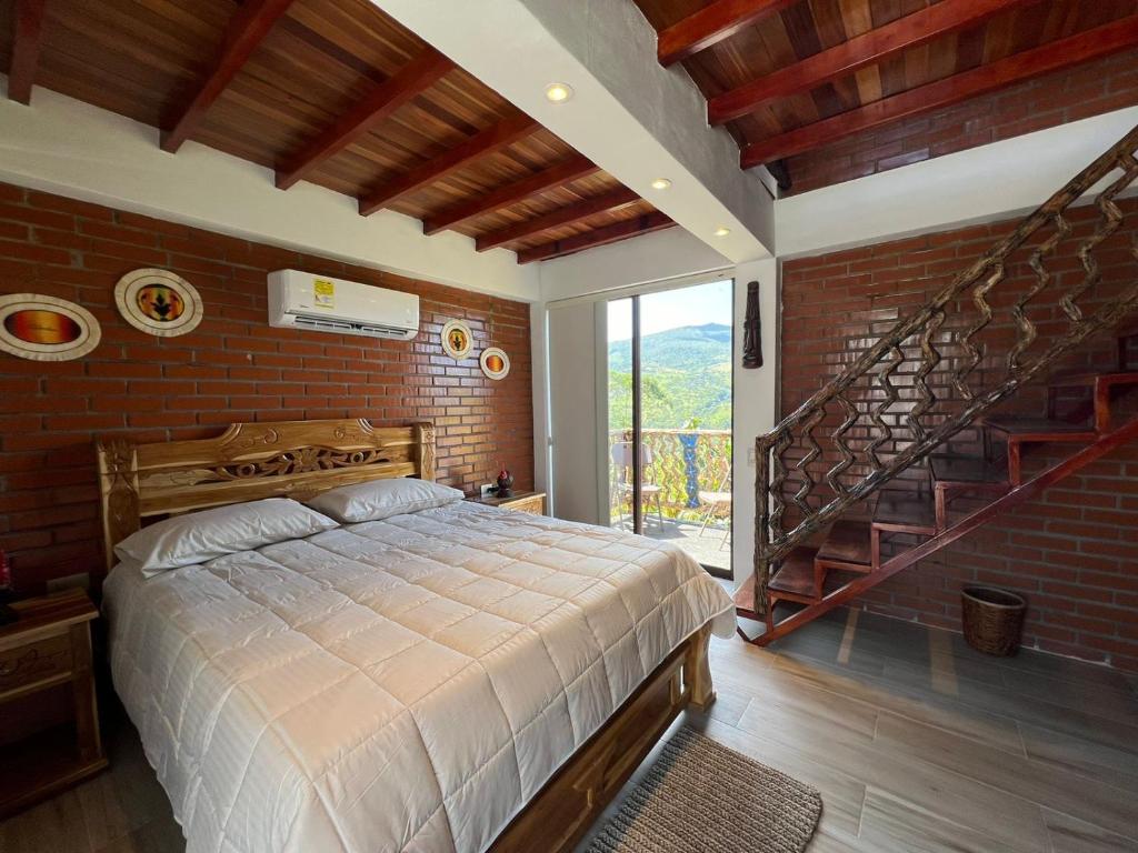 Postel nebo postele na pokoji v ubytování Hotel Eco Glampling Santillana