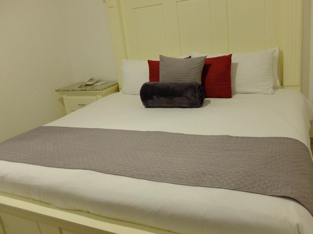 Postel nebo postele na pokoji v ubytování Hotel Estancia Real