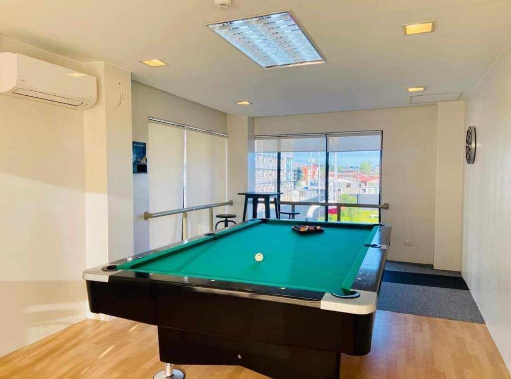 Biliár nebo kulečník v ubytování COZYTEL Centro