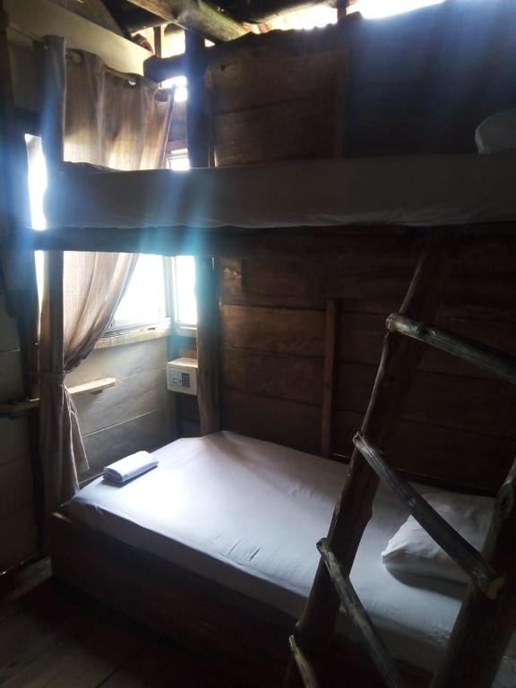 Postel nebo postele na pokoji v ubytování Mi Cabañita Guest House