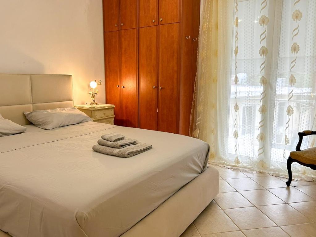 Postel nebo postele na pokoji v ubytování Zakynthos centro Riviera