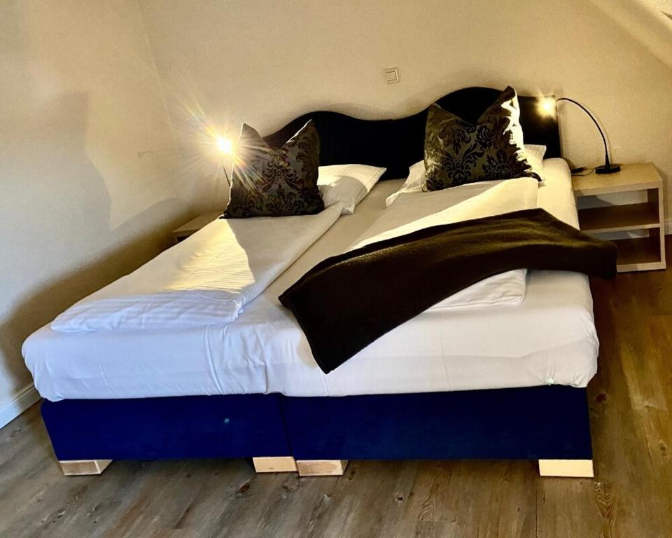 Postel nebo postele na pokoji v ubytování Residenz Hotel Neu Wulmstorf