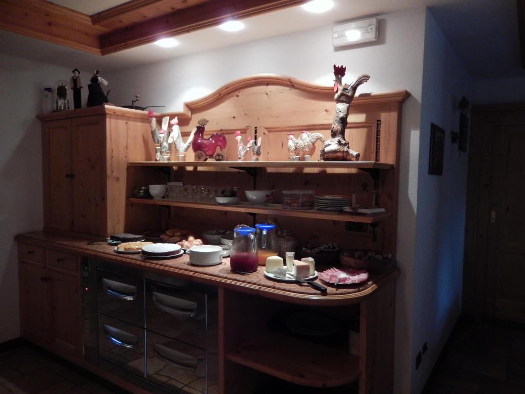 Kuchyň nebo kuchyňský kout v ubytování Albergo du Soleil
