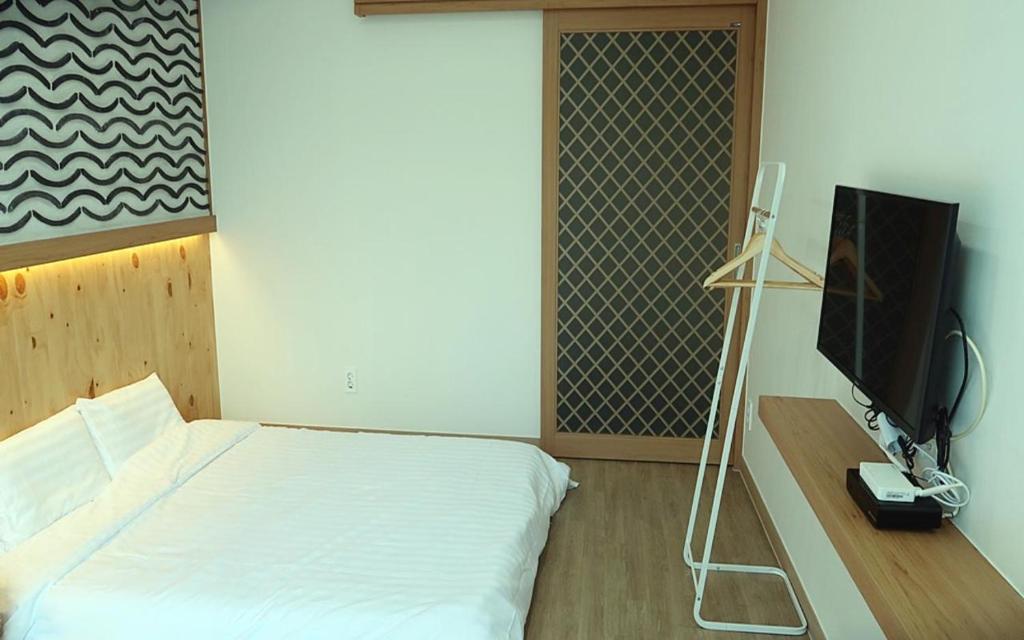 TV a/nebo společenská místnost v ubytování 38th Street Guesthouse