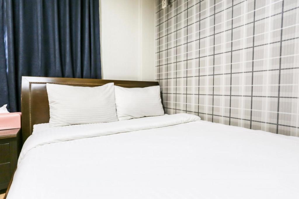 Postel nebo postele na pokoji v ubytování Nokwon Motel