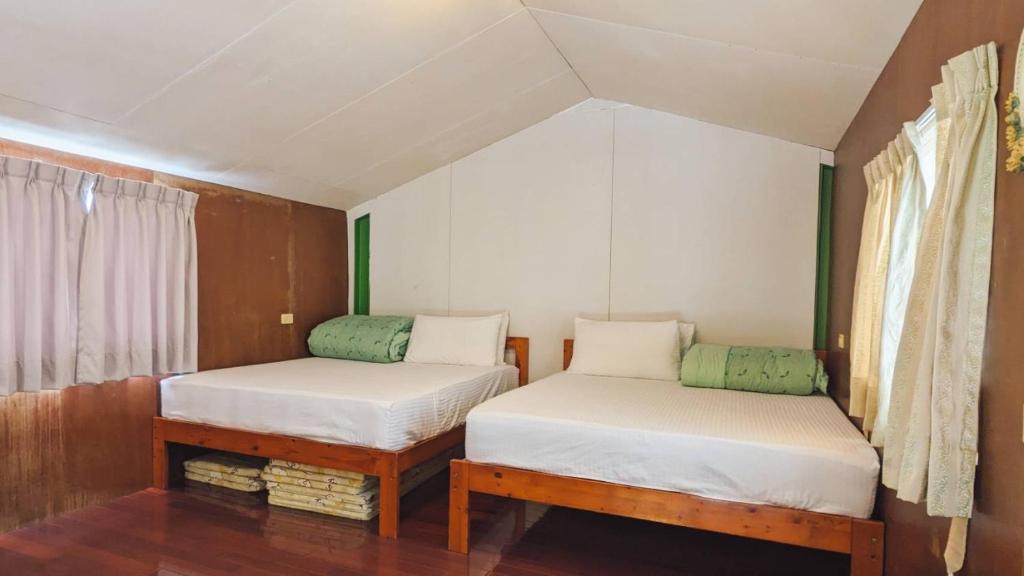 Postel nebo postele na pokoji v ubytování Tap Bed & Breakfast