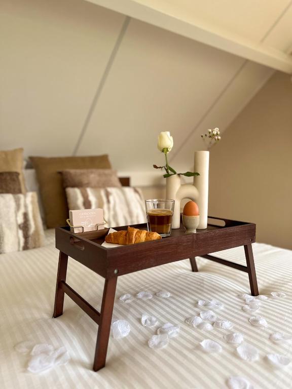 Postel nebo postele na pokoji v ubytování B&B Giethoorn