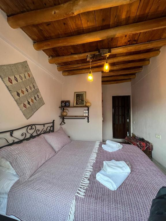 Postel nebo postele na pokoji v ubytování Zen Cappadocia