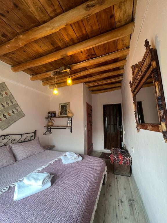 Postel nebo postele na pokoji v ubytování Zen Cappadocia