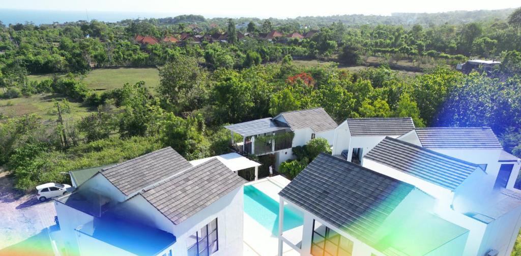 an aerial view of a house with solar panels on its roofs at Villa Valeria in Ungasan