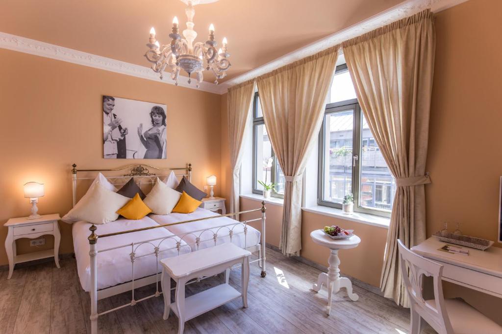 Voodi või voodid majutusasutuse Grande Albergo Giancarlo toas