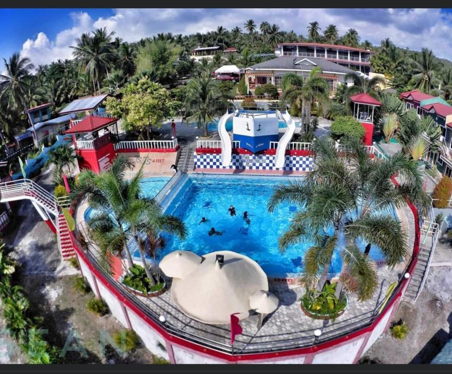 - une vue aérienne sur la piscine d'un complexe dans l'établissement JSJS Mountain Resort powered by Cocotel, 