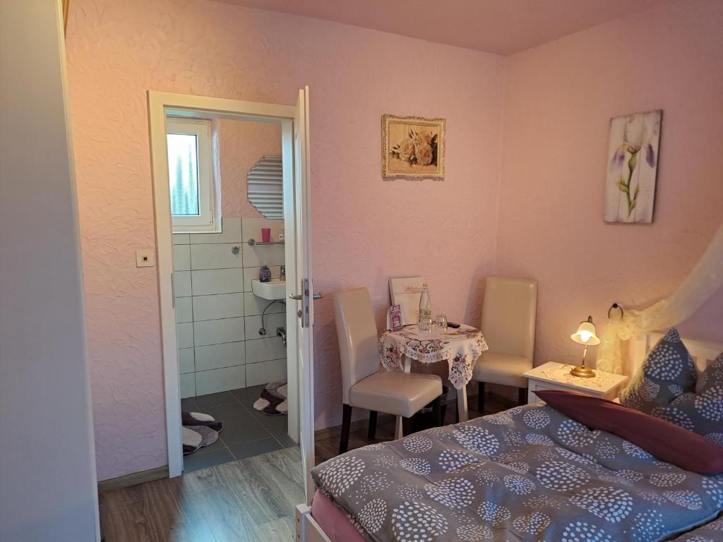 Postel nebo postele na pokoji v ubytování Pension Sander