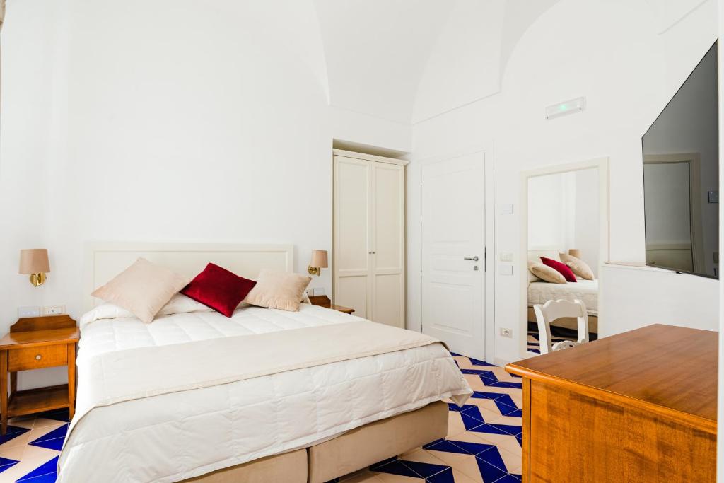 Ένα ή περισσότερα κρεβάτια σε δωμάτιο στο Hotel Da Raffaele