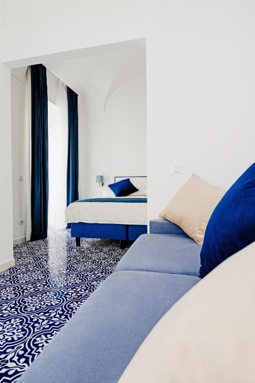 Ένα ή περισσότερα κρεβάτια σε δωμάτιο στο Hotel Da Raffaele