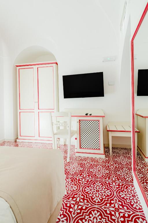 Ένα ή περισσότερα κρεβάτια σε δωμάτιο στο Hotel Da Raffaele