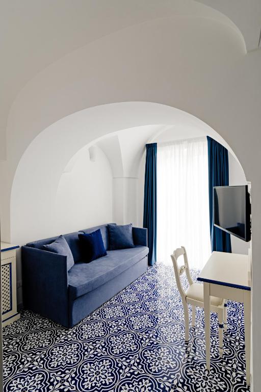 Ένα ή περισσότερα κρεβάτια σε δωμάτιο στο Hotel Da Raffaele