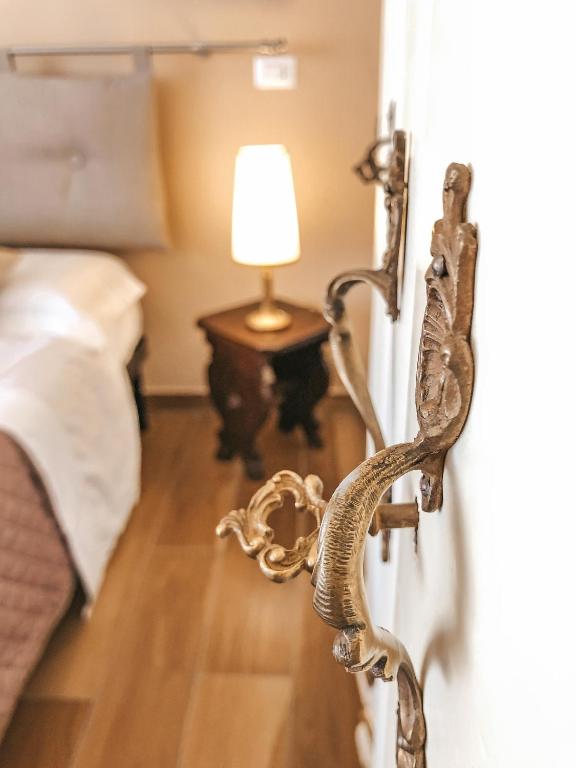 Łóżko lub łóżka w pokoju w obiekcie Alle Porte Del Barocco
