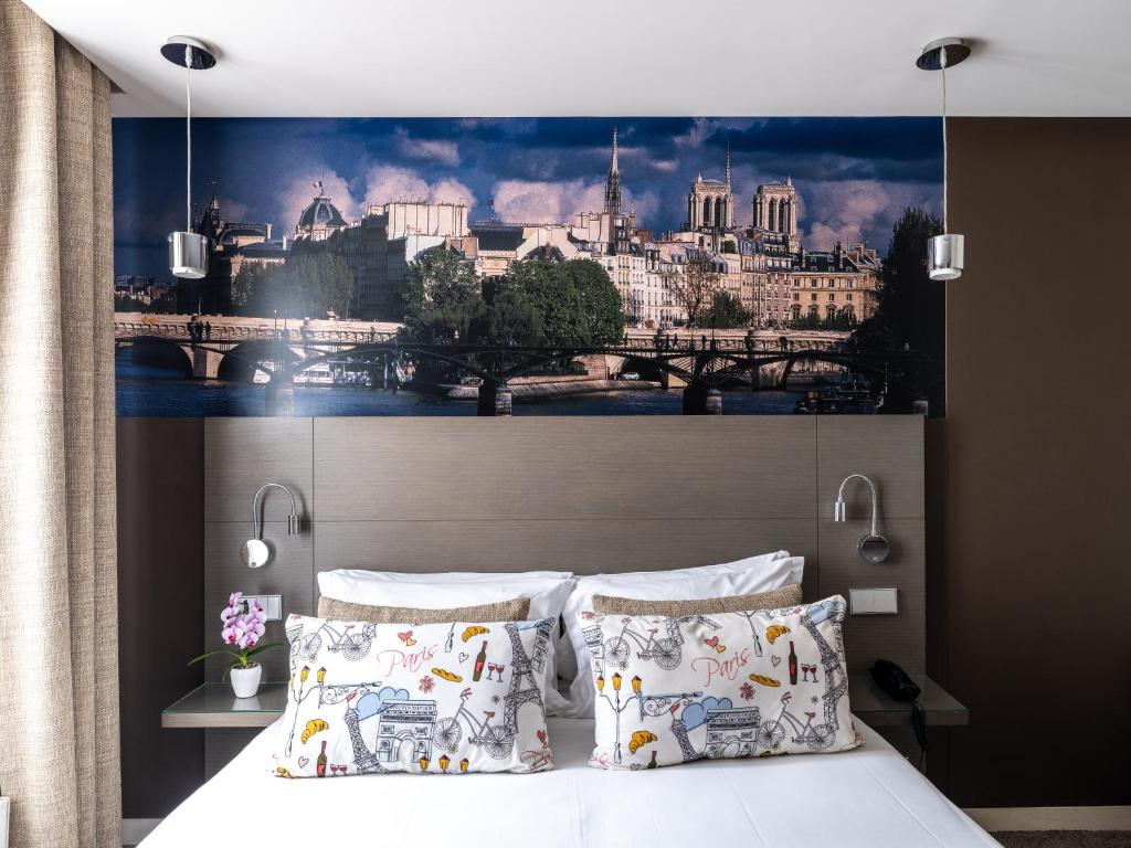 Postel nebo postele na pokoji v ubytování Hotel Minerve