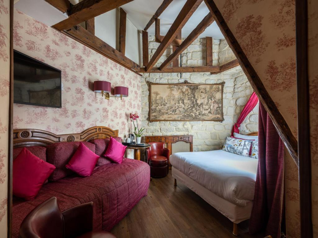 Postel nebo postele na pokoji v ubytování Hotel Minerve