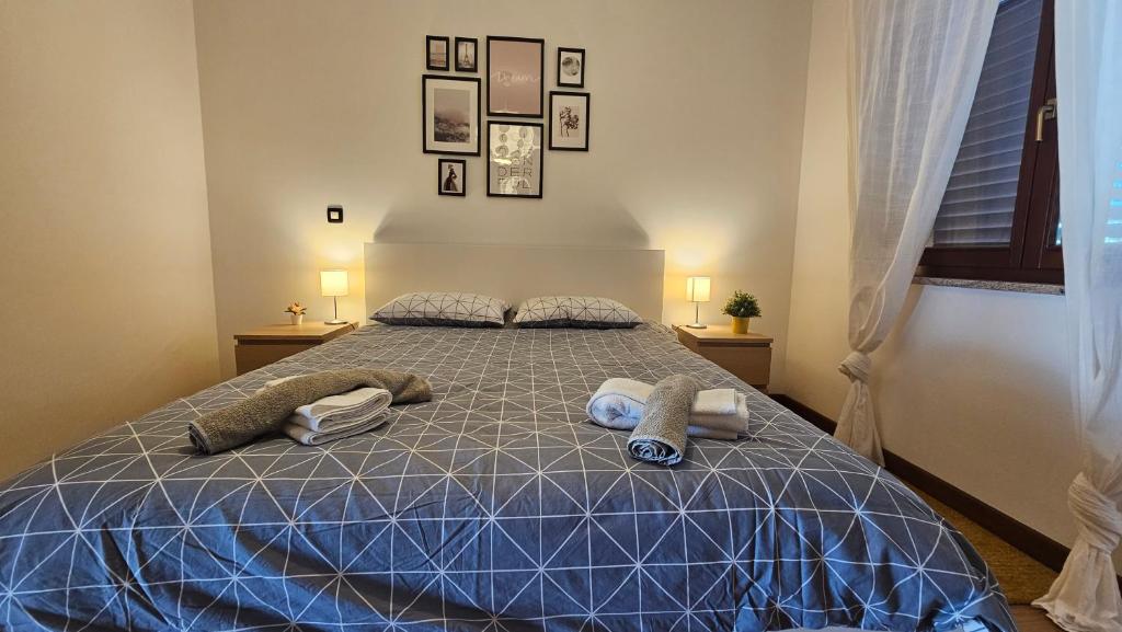 Postel nebo postele na pokoji v ubytování Apartment Bluemare with shared pool