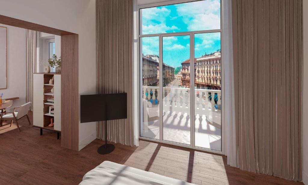 TV a/nebo společenská místnost v ubytování Palazzo Cordusio Gran Melia - The Leading Hotels of the World
