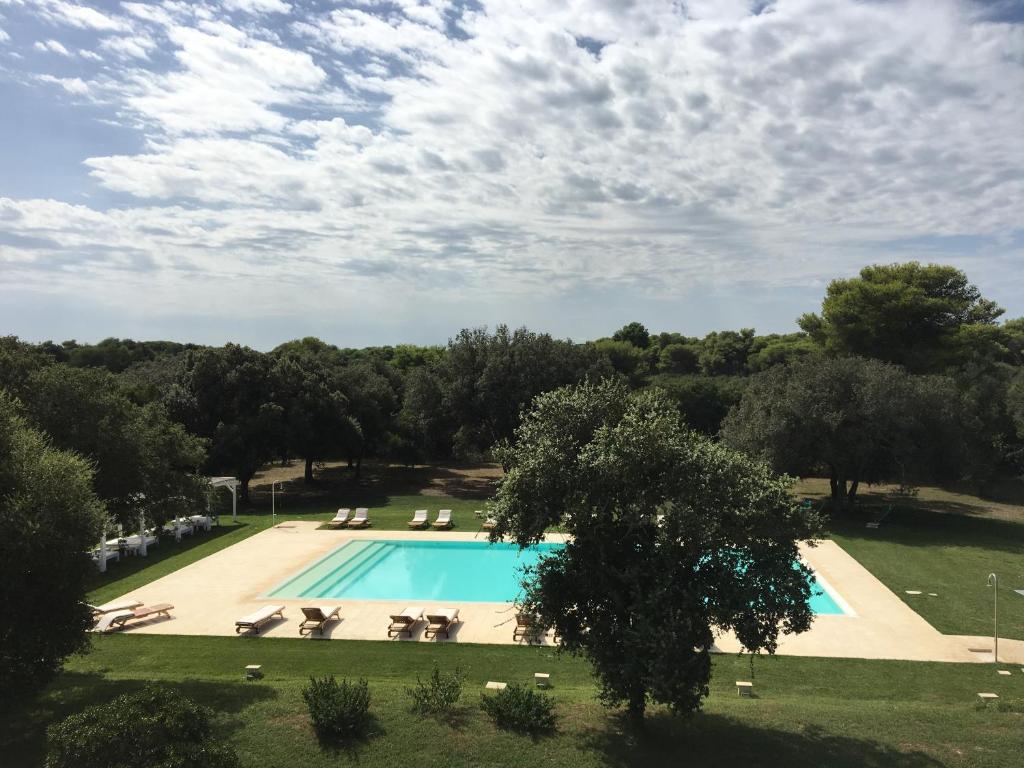 an image of a swimming pool in a park at Residence Altair - Serra Degli Alimini 3 in Otranto