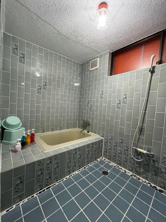 Koupelna v ubytování ロビンホテルRobin Hotel
