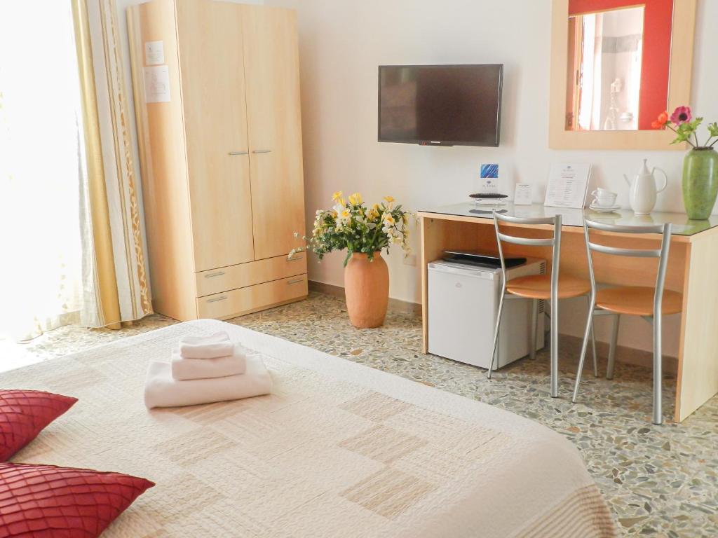 Postel nebo postele na pokoji v ubytování Actinia Accommodation