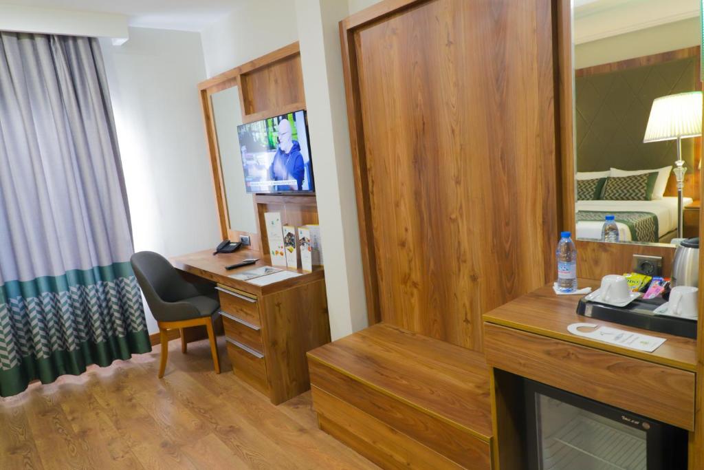 UNITED HOTEL INTERNATIONAL - Camera Matrimoniale Deluxe Con Bagno
