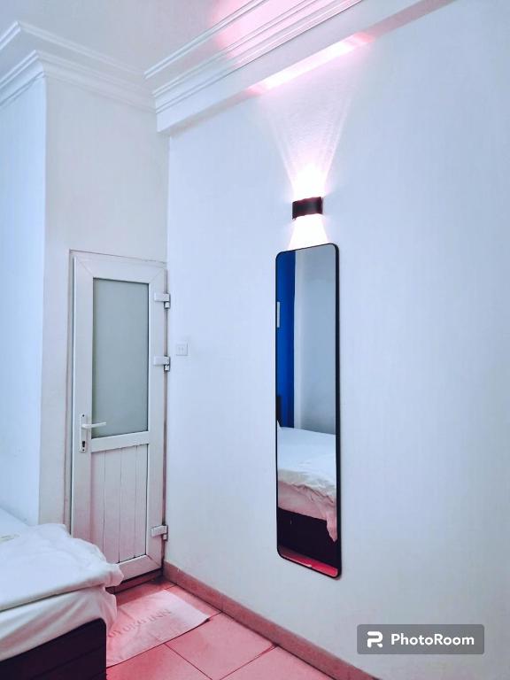 Postel nebo postele na pokoji v ubytování Bluebell Hotel