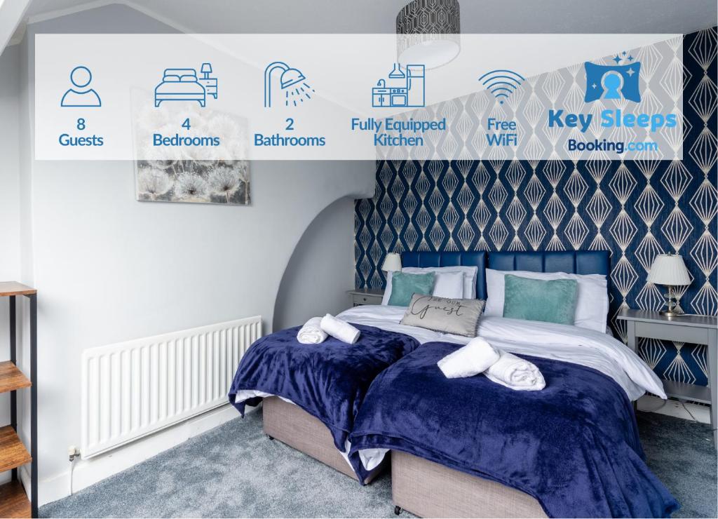 a bedroom with a bed with blue and white sheets at NEW Four Bedroom House By Keysleeps Short Lets Workington Contractor Leisure Beach Location Lake District in Siddick